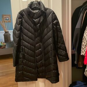 Calvin Klein in lightweight pack able down coat. Size medium